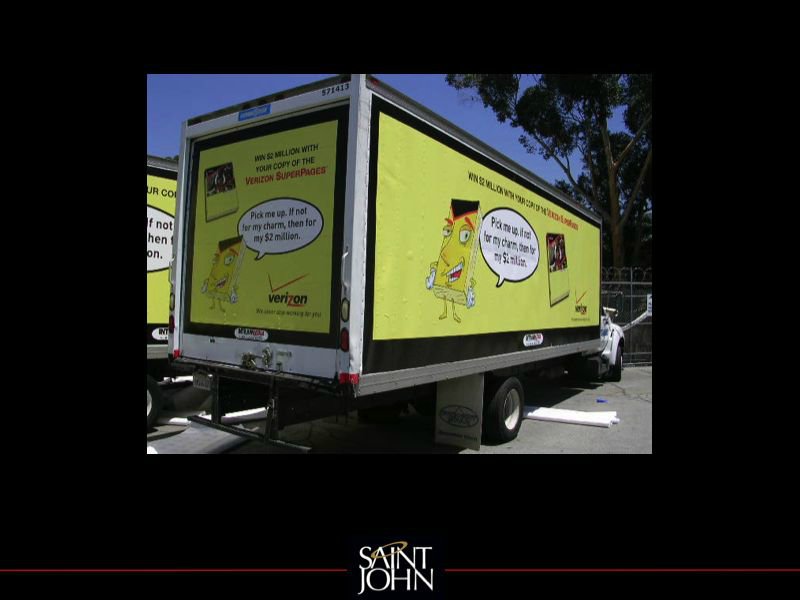 Yellow Verizon SuperPages truck promotion with directory characters and a two million dollar prize message